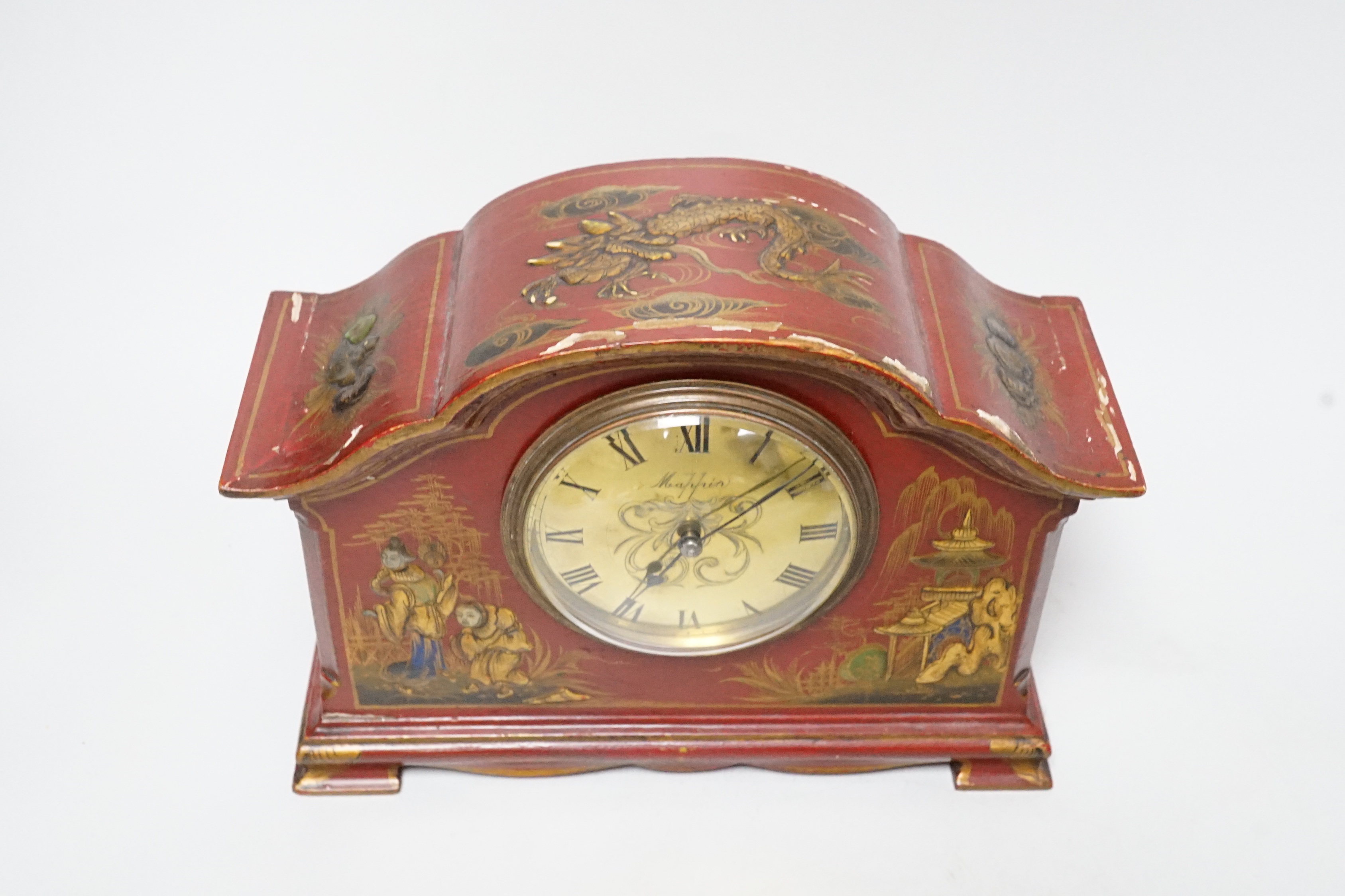 A French chinoiserie mantel clock by Mappin, and an Edwardian inlaid book trough, 25cm